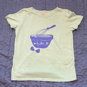 Size 7-8 Mini Boden Light Green Tee with Blue Bake Design
